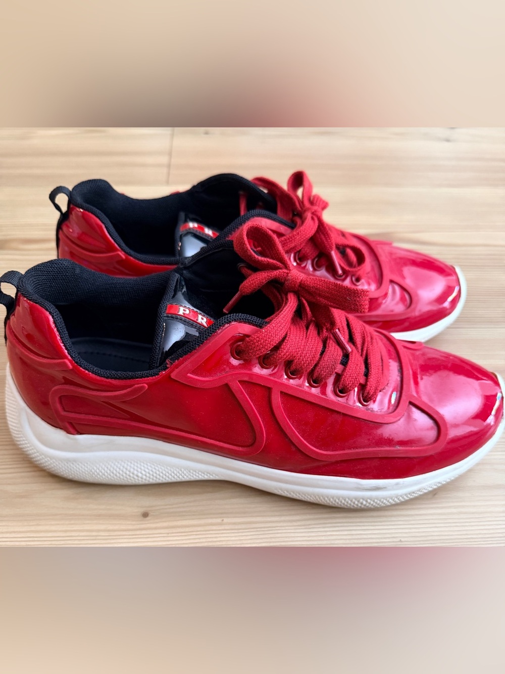 Prada America’s Cup Sneakers – Racing Inspired Luxury in Red Patent Leather